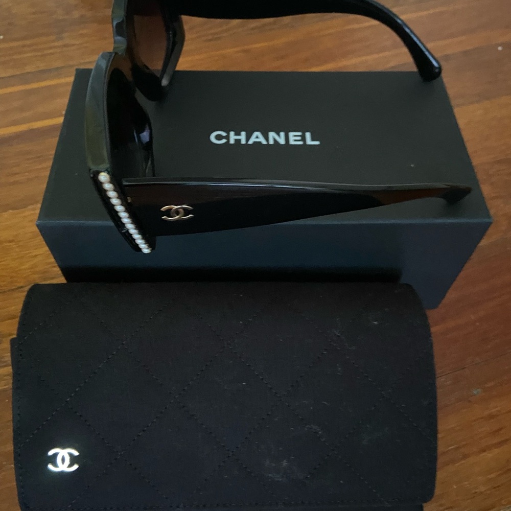 New in box Chanel sunglasses black acetate with Pearl details
